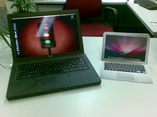 The printable MacBook Air model next to a black MacBook